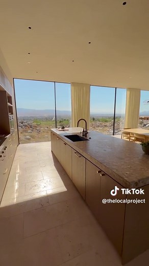 Floating above Palm Springs is Desert Palisades by Woods Dangaran, a family home that was built with the goal to introduce a more international style of modernism to the desert landscape. Starting from a concrete masonry base, the home is made from CMU blocks that appear to extend from the soil surrounding the home, brass that will patina over time and allow the home to appear as part of the land. Further complemented with a glass façade on the eastern portion of the home, which allows for a foc