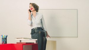 sexy teacher in classroom or corporate office