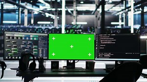 Green screen computers in data center managing energy consumption using node tree software. Mockup PC systems automating monitoring processes in server room using visual programming tools