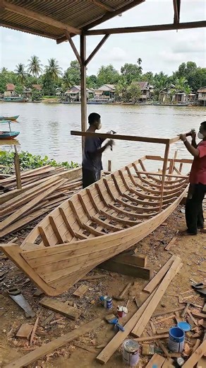 Small Wooden Boat For Fishing In The River