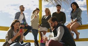 Happy Group Of Friends Hanging Out At Beach Stock Footage SBV-321146111 - Storyblocks