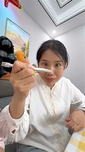 The little cutie has many weird toys!