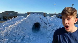 Building a giant snow fort in a parking lot