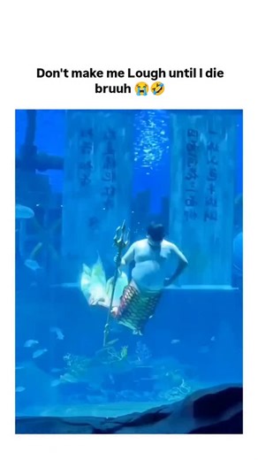 Thetrandlab48 on Instagram: "The post shares a 62-second viral video from Jinan Sunac Ocean Park in China, featuring a plus-size merman performer confidently swimming and interacting with fish, whose jiggling movements elicit laughter and admiration for body positivity. - With over 1.1 million views and 41k likes since December 23, 2025, the clip revives April 2025 buzz around the performer’s unapologetic style, turning an aquarium show into a global meme on inclusive entertainment. - Replies bl