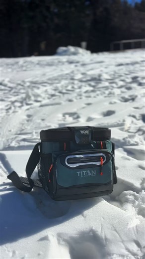 Meet the Titan by Arctic Zone™ Zipperless Cooler®, the perfect snow adventure companion! ✔️ Easy access Zipperless™ lid ⚙️ Practical features like built-in bottle opener 🧊 Ice for days 💡 Interior hard liner with shelf 👌 Ergonomic shoulder strap 💪 Constructed with high-quality materials built to last Discover the Arctic Zone, Titan and Titan PRO family of brands. We pride ourselves on creating superior products so that you can #GoBeyond. | Arctic Zone