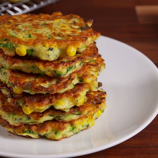 Zucchini Corn Cakes are like savory pancakes, and your brunch needs them. Full recipe: http://dlsh.it/vfmk6F0 | Delish