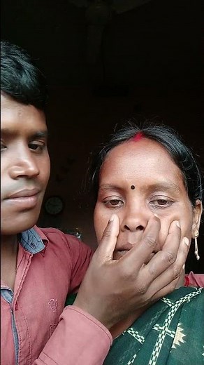 pinching beautiful wife nose