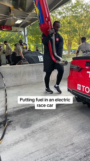 Inside a NASCAR Pit Stop: Putting Fuel in an Electric Race Car