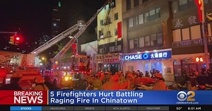 Firefighters hurt battling raging Chinatown fire