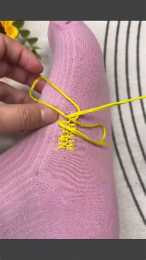 Creative sewing technique to turn a hole in socks into stylish pattern #sewingtips #needlework #DIY