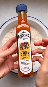 🔥 CRISPY MANGO CHILLI COD BUN 🔥 Golden, crispy cod meets the sweet heat of Encona Indian Mango Chilli Sauce 🥭💥Layered with fresh slaw, zesty mayo, and packed into a toasted brioche bun. Pure flavour, pure crunch! Who’s ready for a bite? 👀👇 #EnconaSauces #TastesThatTakeYouPlaces #CrispyCod #MangoChilliMagic #EnconaSauces #TastesThatTakeYouPlaces #FlavourPairings | Encona
