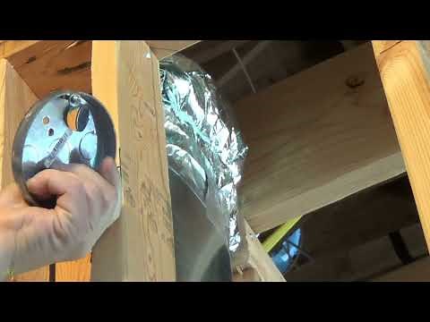 Installation of a 4” round shallow pancake junction box for a bathroom vanity light outlet