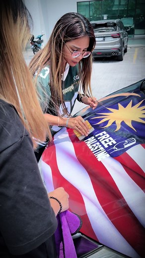 Supporting Palestine with Car Sticker Installation