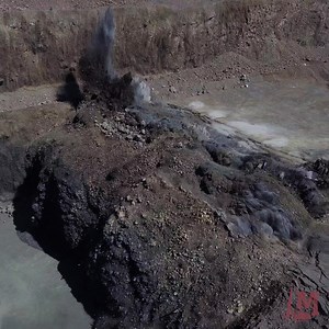 1.4K views · 42 reactions | Basalt is a much easier rock to break than the granite shot we posted earlier this week and requires a lower powder factor. For this blast we used 18,390 lbs of emulsion across 30 holes for a .9 powder factor. Let’s go! #rockblasting #explosives #construction | McCallum Rock Drilling | Facebook