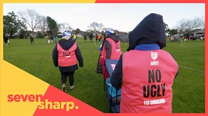 Led by Val at the Mangere East Hawks Rugby League Club, the aunties gently wander the sidelines of Walter Massey Park to remind people what's expected when spectating sport. Michael Holland went along. | Seven Sharp