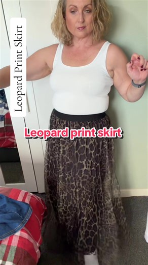 Leopard print floaty skirt. This is a beautiful skirt. I am 5’6” and it’s ankle length. It’s beautyiful and floaty. You can grab yours in the link in the yellow basket. #leopardprint #tiktokmademebuyit #skirt #giftidea #fashiontokshop