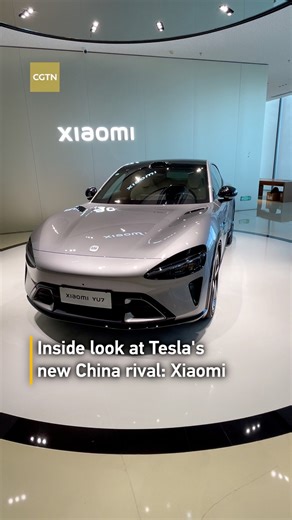 763K views · 2.1K reactions | Chinese tech company Xiaomi unveiled its new $35,000 sport utility vehicle, the YU7, on Thursday and received more than 200,000 orders within minutes. The Beijing-based smartphone and appliance maker entered the electric vehicle (EV) market in 2021 and has since made a name for itself as one of the top-selling car brands in China. Join CGTN's Wang Tianyu for a sneak peek inside a car factory of the new EV player that is being compared to Tesla. | CGTN | Facebook