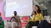 Close-up of a woman talking on an AI panel discussion