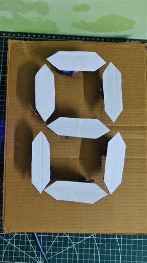 gsncreation on Instagram: "This 7-segment display moves 😱 No LEDs… only servo motors + Arduino 🤯 A mechanical 7 segment display built using Arduino UNO & PCA9680, where each segment physically moves to form numbers from 0–9. Simple idea, insane output 🔥 Would you try this project? 👇 Save • Share • Follow for more Arduino builds ⚙️ Full video uploaded in youtube channel and link in bio 🥳 7 segment display using servo motor arduino servo motor project mechanical display arduino arduino innova