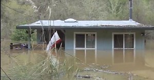 Russian River flooding turns California town into island