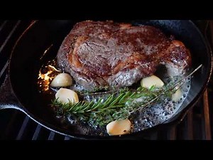 Cast Iron Cooked Steak On A Gas Grill