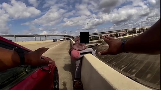 Dramatic video: Deputy pulls woman back from ledge of overpass