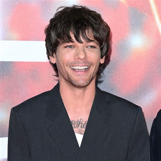 Louis Tomlinson's Son Freddie, 8, Makes Rare Appearance During Family Trip