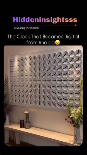 @hiddeninsightsss on Instagram: "What looks like a wall of tiny analog clocks is actually a single, mesmerizing digital timepiece. Each pair of clock hands moves in perfect harmony with the others, coming together to form the current time in a digital-style display. Between transitions, the hands dance in mesmerizing synchronized patterns - blending precision engineering, kinetic art, and minimal design. This installation, known as the ClockClock 24, reimagines how we perceive time - turning eve