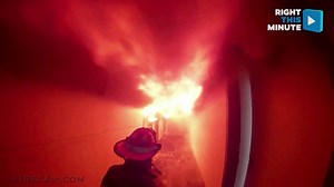 Firefighters Battle a Hall of Flames