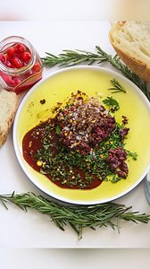 80K views · 1.4K reactions | We love bread dipping oil don’t we?Olive oil, Balsamic vinegar, Shallot, Salt, Pepper, Biquinho peppers, Red pepper flakes, Parsley, Kalamata Olives, minced Garlic, Grated parm | The Naughty Fork | Facebook