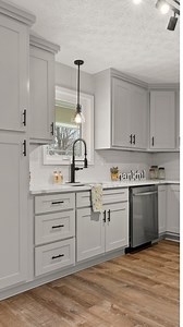 Loving how this kitchen turned out ✨ I went with the color Revere Pewter by Benjamin Moore for the cabinets. This color really gives a cozy and warm feeling, and is easy to style around. Would even look amazing with some gold hardware, as opposed to the black that I chose to stick with. So many possibilities of options! Now onto the hunt for our next remodel 🛠️🏠 #homeremodel #homeimprovement #homestyle #homeinterior #diyhome #smalltownflip #lovewhereyoulive #homedesign #kitchenremodel | Home w