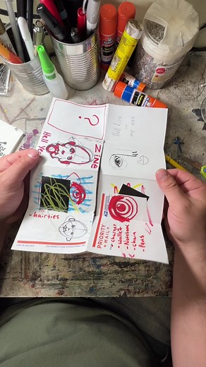 How to make a zine!!! This is a fun craft project to do with kids or for your own art. It makes great band merch, great for art trades, & an excellent way to get your art out there. Try it! #craftproject #zine #eightpagezine #howtomakeazine #artclass #artgroup #artforkids #artideas #craftideas #punkrock #skillsharing #diyart #mixedmediaart #artsandcrafts #artteacher #artsong #musicvideo #sharpieart
