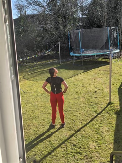 Enjoying the Sun While Washing Clothes