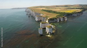 Take in breathtaking 4K Aerial Drone video views of the Jurassic coast and unique rock formations on this Old Harry Rocks geological limestone formation