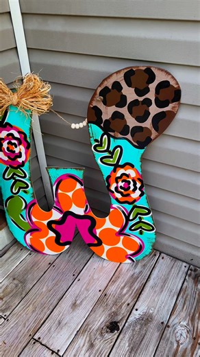 10K views · 124 reactions | I paint about a dozen of these big letters every week! Have you ordered one?! https://doodle-dots-more.myshopify.com/collections/everyday-custom-hangers-templates/products/floral-initial-door-hanger | DoOdLe DoTs | Facebook