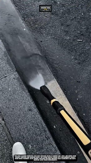 Road cleaning worktool used to remove dirt from asphalt edges using pressure washing #worktool