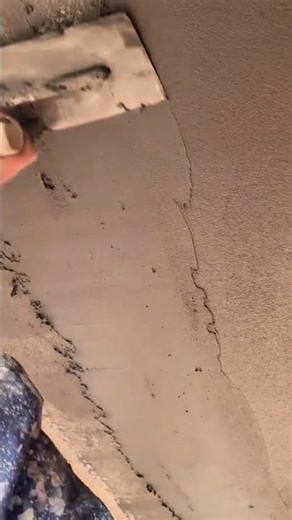 manual steel float to apply a thin, even layer of cement or plaster onto a masonry wall