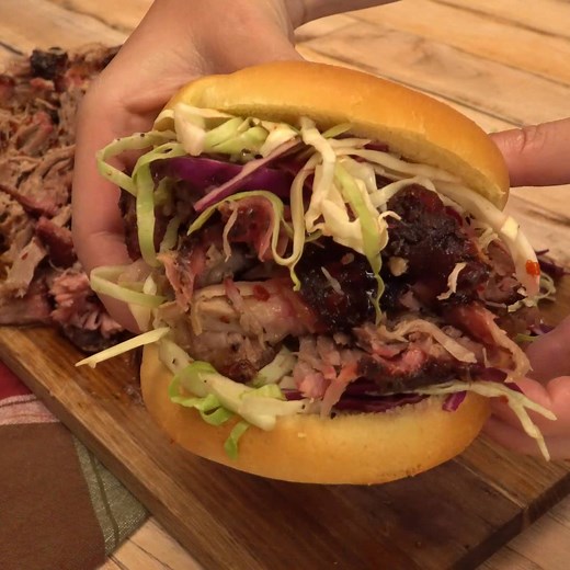 The tangy vinegar-based sauce in this CAROLINA STYLE PULLED PORK brings everything together! RECIPE HERE: https://heygrillhey.com/carolina-style-pulled-pork/ | Backyard BBQ