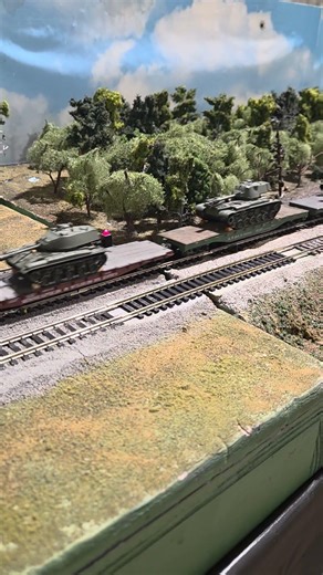 Military train running on the Western Maryland Modular Layout.