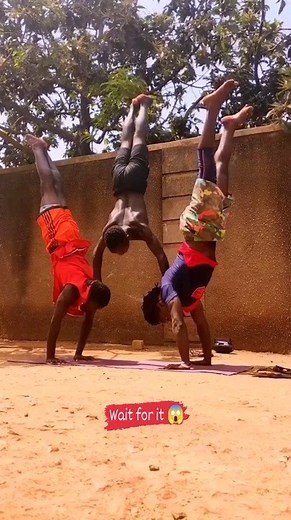 Three Guys Perform Incredible Handstand
