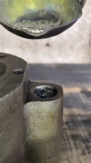 Real Engineerings | Engineering & Technology & Gadgets & DIY on Instagram: "Thread Resurrection: Liquid Metal Rescue for Stripped Parts! 🔥🔩 ​Observe the daring and effective repair technique used to save a damaged engine casting! This video demonstrates a "cast-in-place" fix, transforming a stripped, useless hole into a solid, functional mounting point using molten metal. ​The Art of Casting Repair ​This process is a resourceful alternative to using inserts (like Helicoils) when the original m