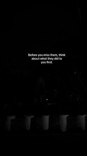 Nighttime Roadside Garden with White Planters