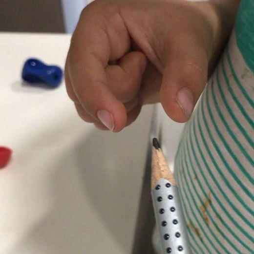 “Pinch and Flip” ... a simple way to help early writers to achieve a dynamic pencil grasp; “pinching” the pencil and “flipping” to rest it in the web space of the hand. This little friend pinched a little too close to the tip but with little hands it is hard to get the “flip” if the pencil is held further away from the nib. Have you tried this OT tip before? https://www.yourkidsot.com/blog/pinch-and-flip-your-pencil | Your Kids OT