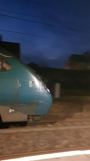 departs at Penrith North Lakes class 390*** AWC working for Edinburgh waverly with a broken 10 tone