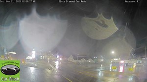 SNOW! Our weather camera located at Black Diamond Car Wash in Negaunee picked up brief snow showers around 3am this morning. Some localized areas received a dusting of snow, officially making this the first "measurable" snowfall for certain parts of the UP. | Michigan Storm Chasers