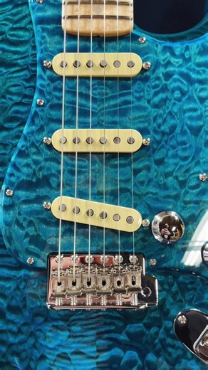 This Strat looks good enough to dive into. 💦 That AAA quilted maple top with the matching pickguard has us running by the pool just to grab it and play. Dive right into this Fender Master Built Custom QMT Stratocaster NOS in Transparent Blue, built by the one and only Dale Wilson at the Fender Custom Shop! 🎸💙 @fendercustomshop #fender #strat #guitars #eddiesguitars | Eddie's Guitars