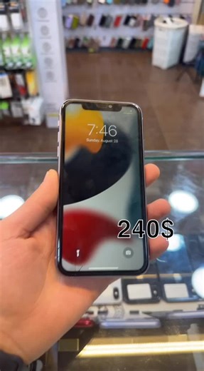 Sleek Smartphone Display in Retail Store