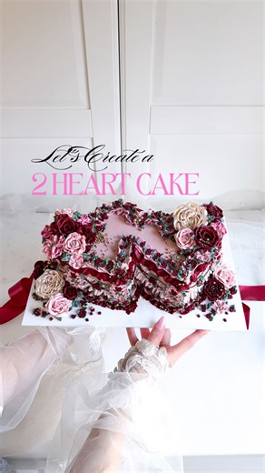ChellBells Cakes 💗 on Instagram: "💖 VALENTINES HEART CAKES 💖 Whilst I was waiting for my baby boy to arrive, I had some spare time on my hands… so I thought, why not try creating a two-heart cake? 🥰 I asked the team @lissieloulondon to create me a 2-heart set of ganache plates and went for a total freestyle Valentine’s theme design. I’m definitely feeling the double-heart cake — it’s so versatile and there’s so much you can do with it! 😍🫶🏻 #valentinescake #heartcakes #ganachecake #wedding