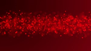 Download Red 4K soft particles in row fading and moving on dark red background for free