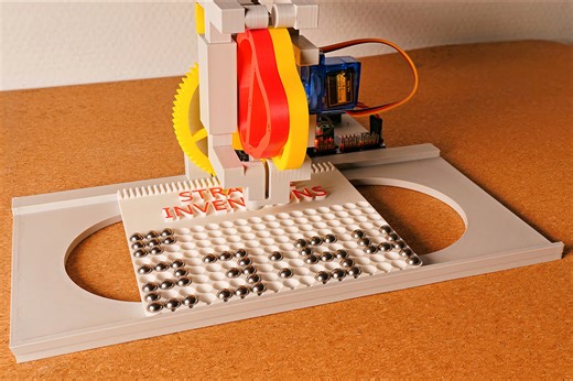 Mini Marble Clock, Possibly the World's Smallest, Quietly Assembles the Time With Steel Balls